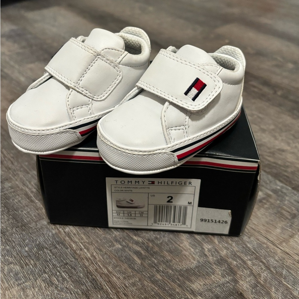 Brand new Tommy Hilfiger crib booties.